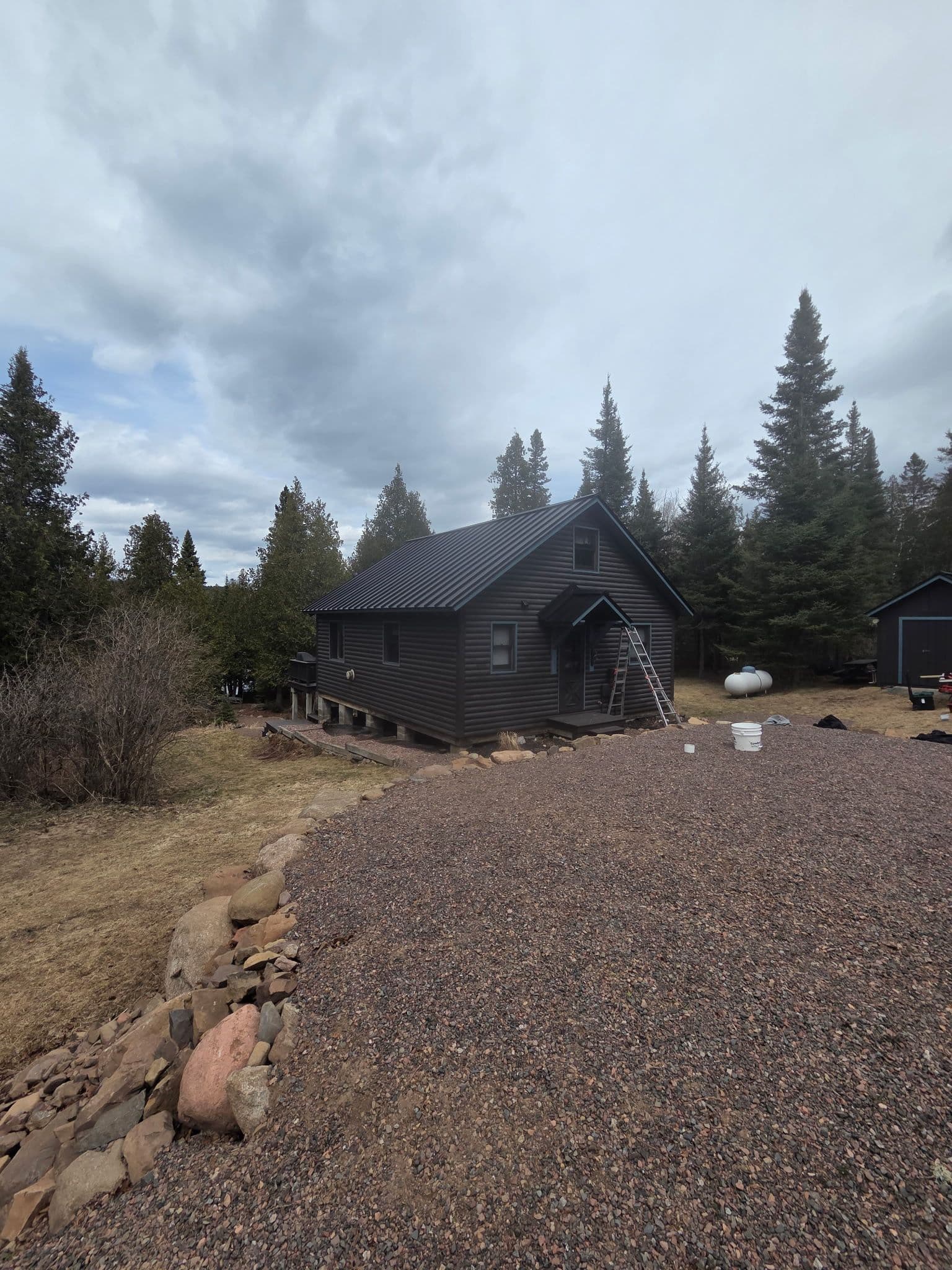 Gallery photos for 24-Gauge Mechanical Seam Metal Roofing on a Cabin in the Woods: Image #2