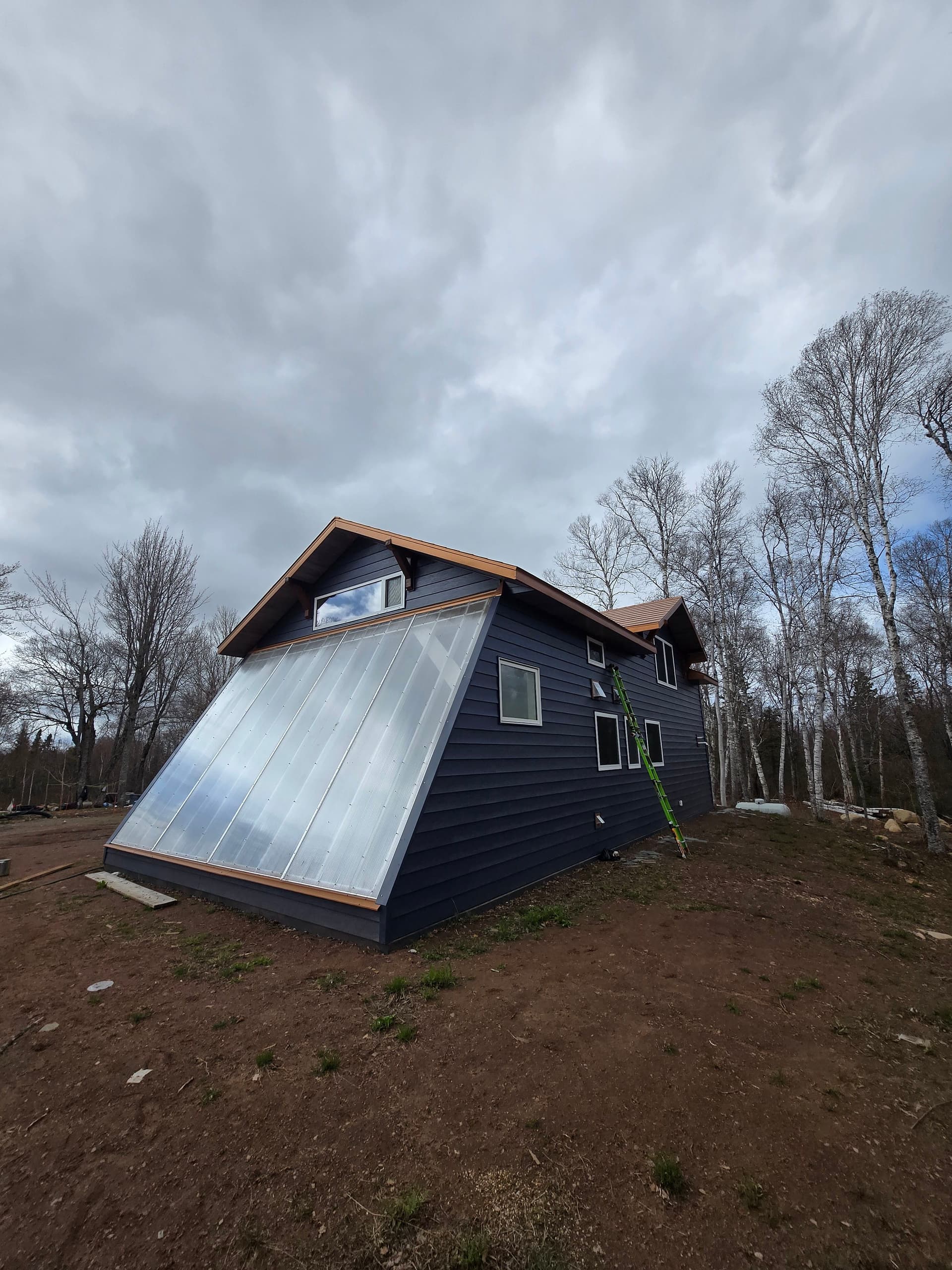 EDCO Steel Siding and Metal Shingle Shake on a Garage Greenhouse Build image