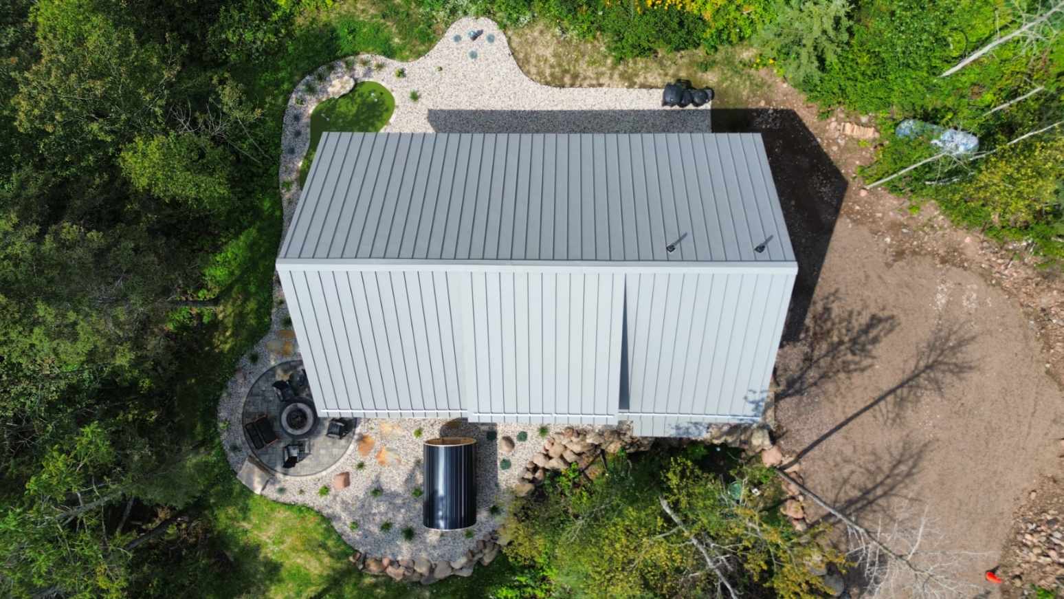 Transformative Metal Roofing for Nature-Embraced Home image