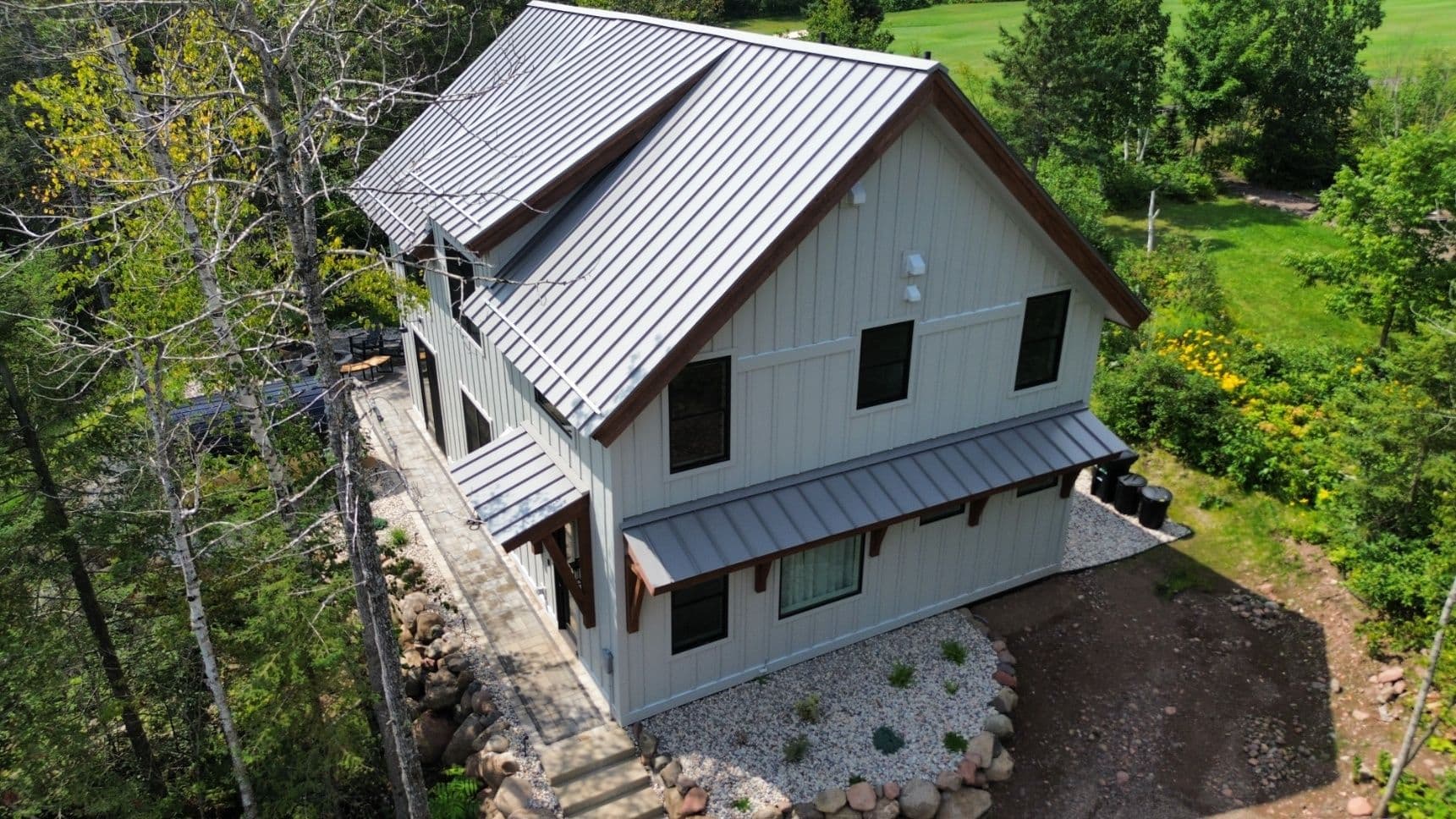 Gallery photos for Transformative Metal Roofing for Nature-Embraced Home: Image #1