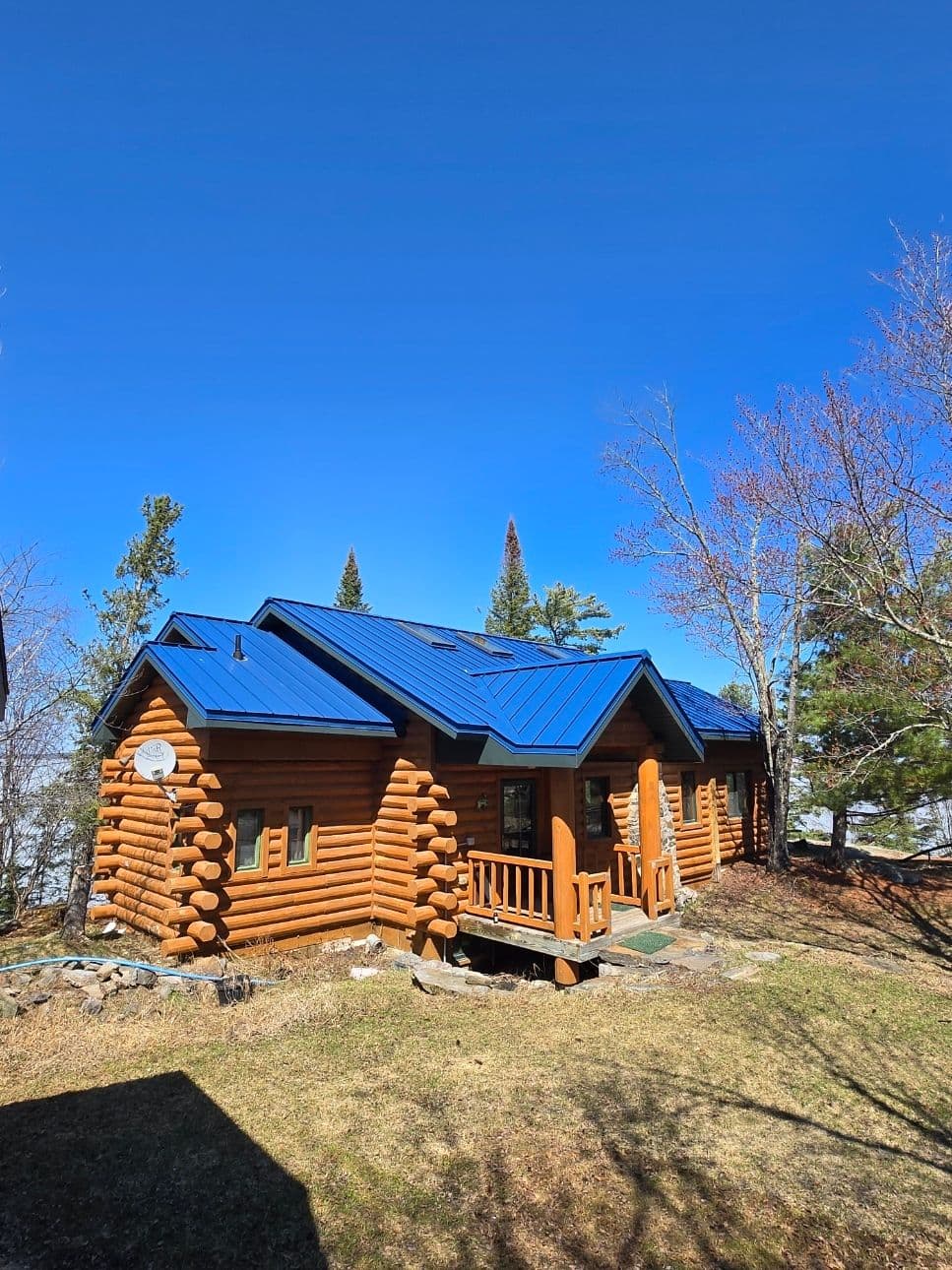 Stunning Royal Blue Roof on Lake Kabetogema Cabin