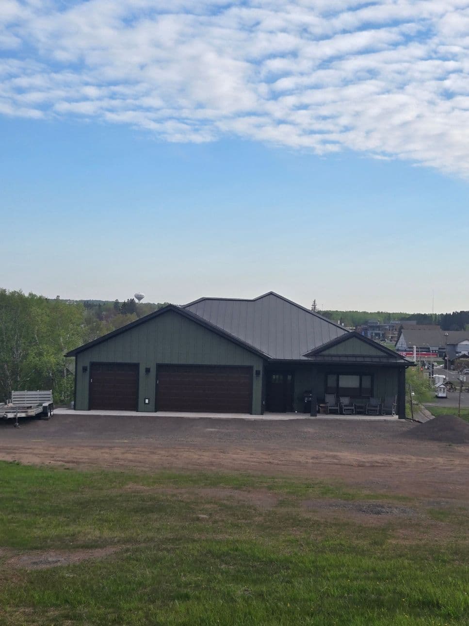 Dark Bronze Metal Roof Transformation in Two Harbors image