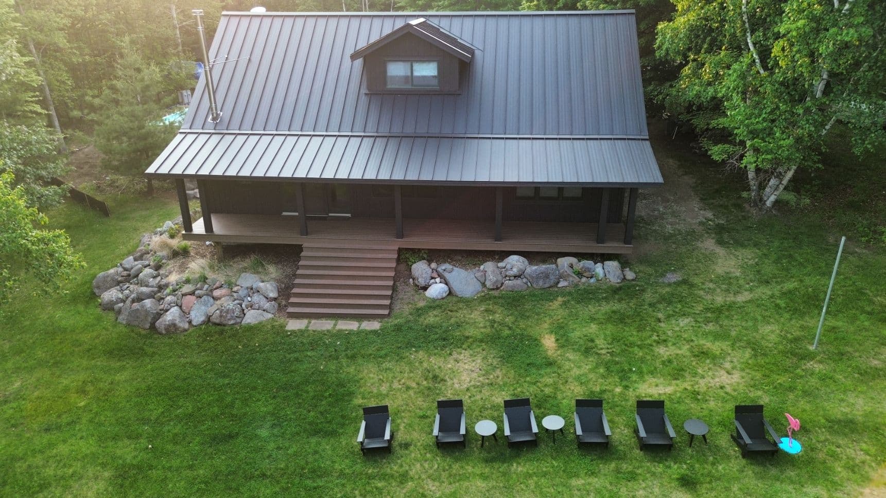 Sleek Modern Metal Roofing for Lakeside Cabin image