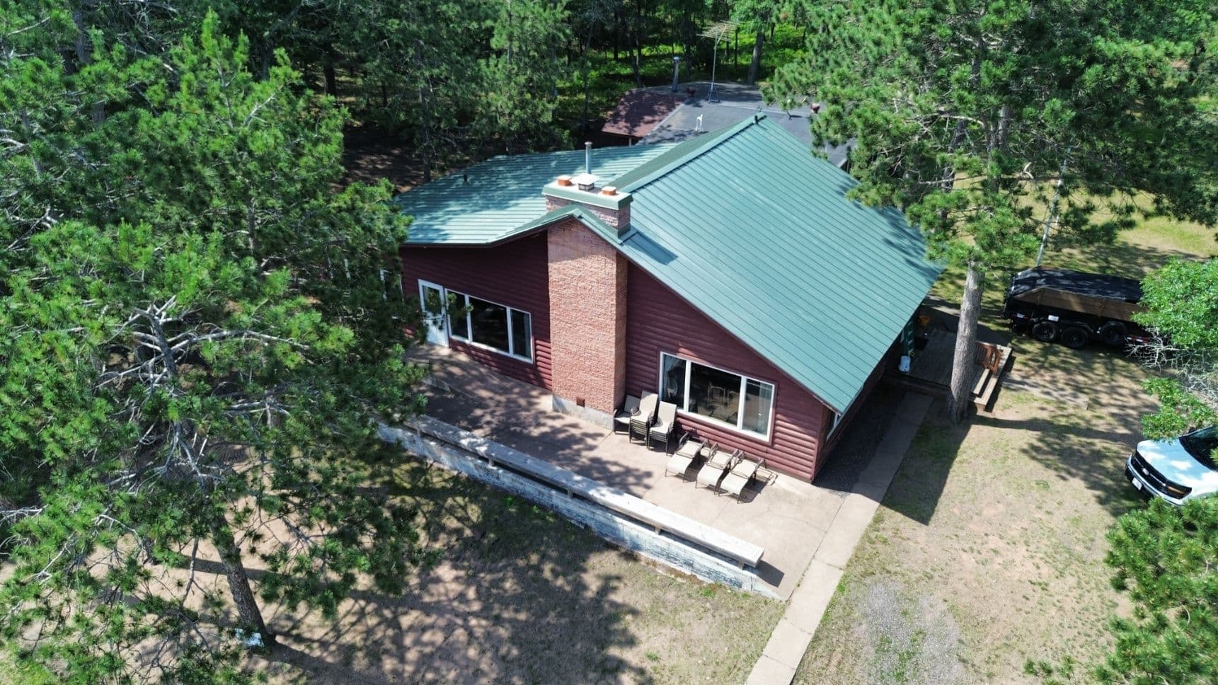 Project Stunning Green Metal Roof Cabin in Wisconsin image