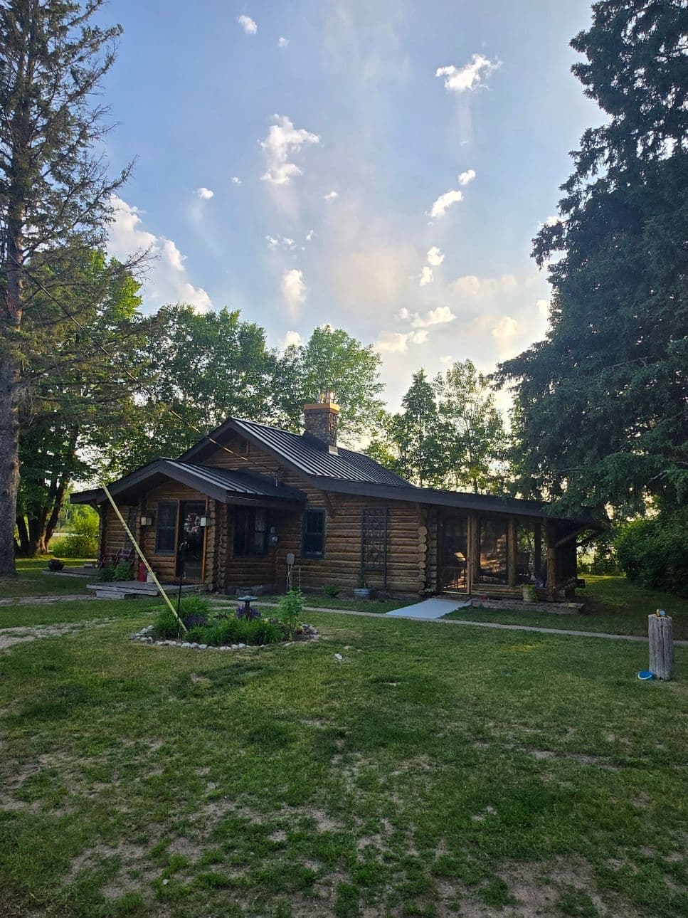 Log Cabin Roofing Project with Seamless Integration image