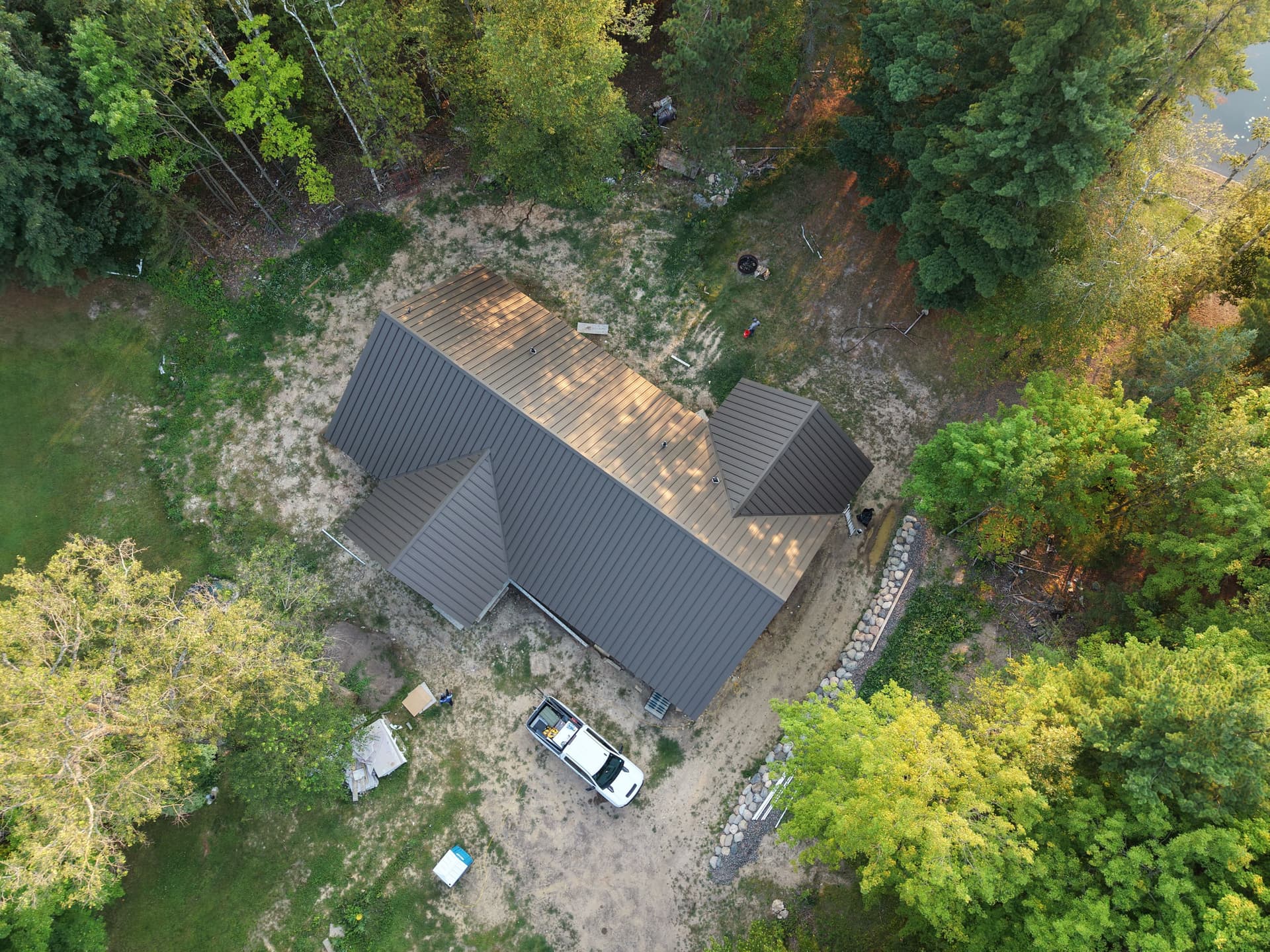Gallery photos for 24 Gauge Mechanically Seamed Metal Roof on a New Lakeside Build: Image #2