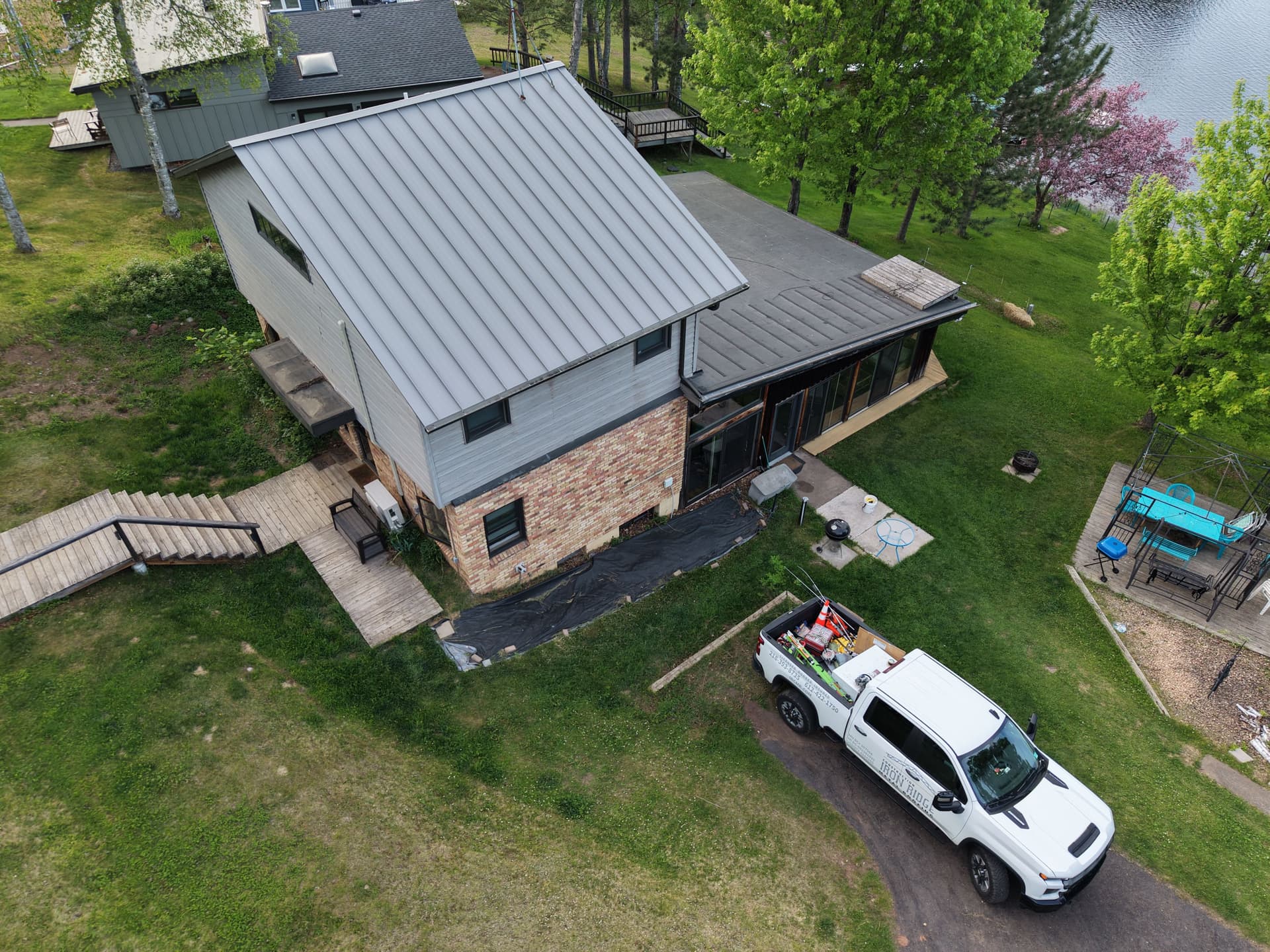 Ash Gray Standing Seam Metal Roof on a Fish Lake Cabin image
