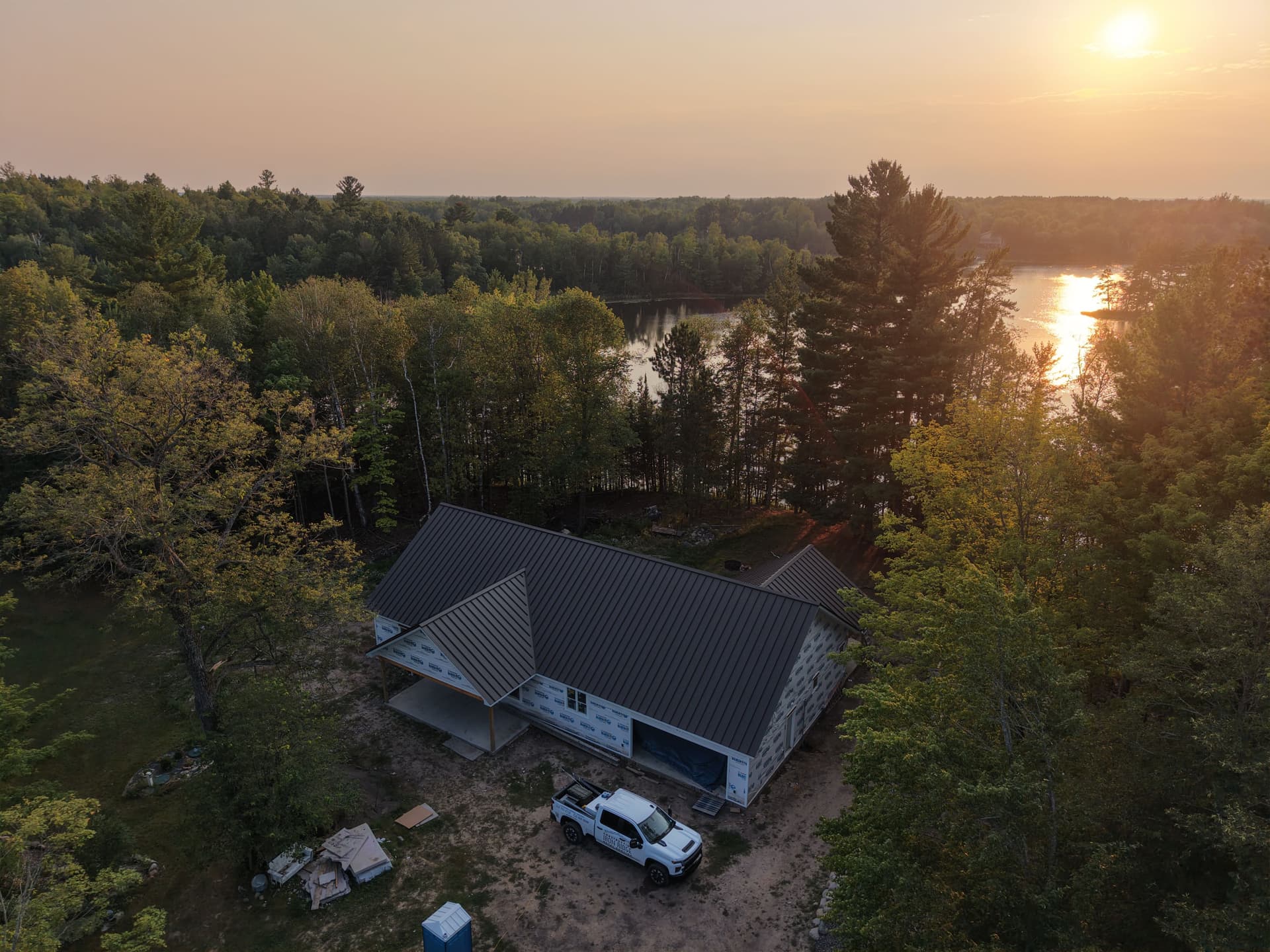 Gallery photos for 24 Gauge Mechanically Seamed Metal Roof on a New Lakeside Build: Image #1